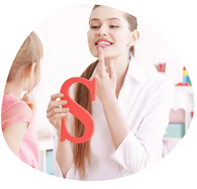 Kids with teacher practicing speech therapy